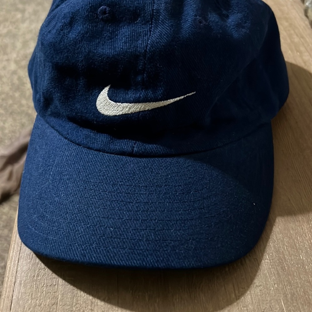 Dark Blue . Nike hat.